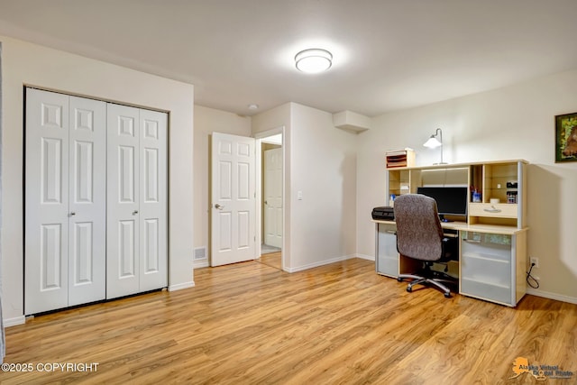 7862 Spruce St Unit 7B, Anchorage, AK 99507 - office area with light wood finished floors and baseboards
