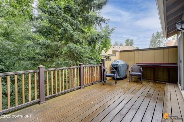 7862 Spruce St Unit 7B, Anchorage, AK 99507 - wooden deck with area for grilling