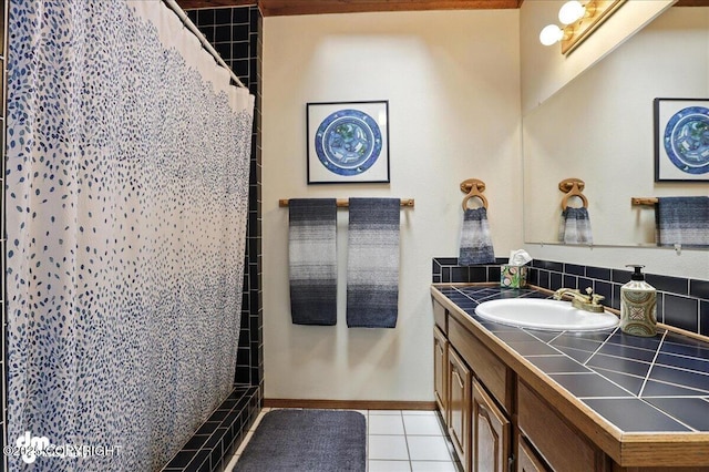 311 Alpine Meadows Ave, Girdwood, AK 99587 - bathroom featuring vanity, a shower with shower curtain, tile patterned floors, and tasteful backsplash