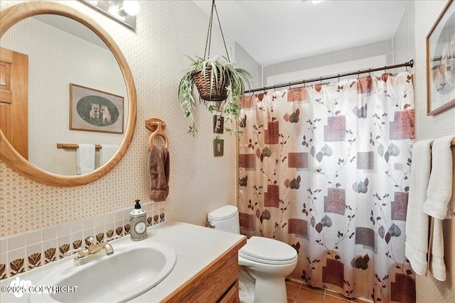 311 Alpine Meadows Ave, Girdwood, AK 99587 - full bathroom with vanity, tile patterned flooring, and curtained shower