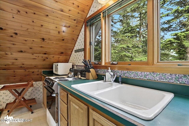 311 Alpine Meadows Ave, Girdwood, AK 99587 - kitchen with white appliances, lofted ceiling, wood ceiling, and wallpapered walls