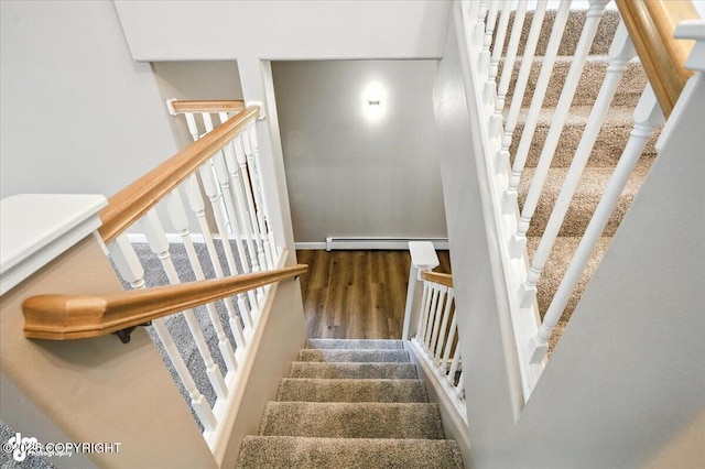 5612 E Beaver Ave, Wasilla, AK 99654 - stairway with baseboard heating and wood finished floors