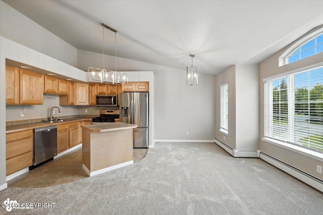 5612 E Beaver Ave, Wasilla, AK 99654 - kitchen with stainless steel appliances, lofted ceiling, a chandelier, healthy amount of natural light, and light carpet