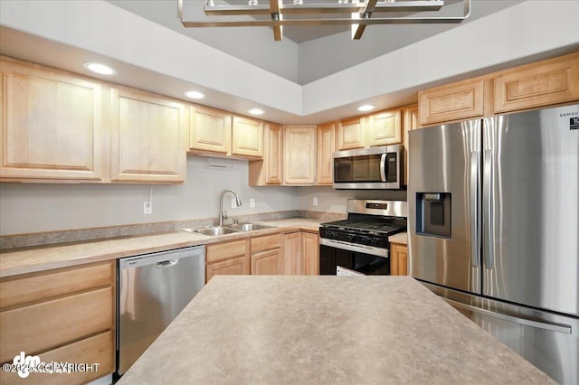 5612 E Beaver Ave, Wasilla, AK 99654 - kitchen with appliances with stainless steel finishes, light brown cabinets, light countertops, and recessed lighting