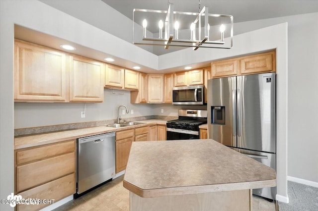 5612 E Beaver Ave, Wasilla, AK 99654 - kitchen with appliances with stainless steel finishes, light brown cabinets, recessed lighting, a chandelier, and light countertops