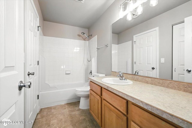 5612 E Beaver Ave, Wasilla, AK 99654 - bathroom with vanity, shower / washtub combination, and stone finish floors