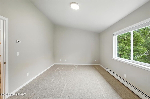 5612 E Beaver Ave, Wasilla, AK 99654 - carpeted spare room featuring baseboard heating and baseboards