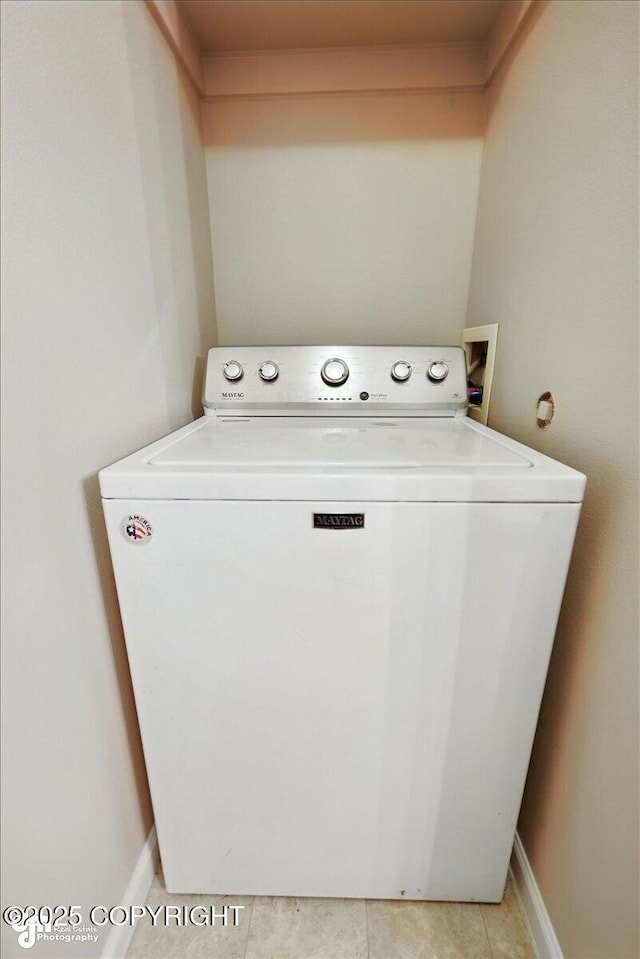5612 E Beaver Ave, Wasilla, AK 99654 - laundry area with washer / clothes dryer and light tile patterned flooring