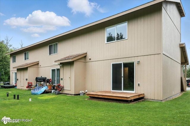 5612 E Beaver Ave, Wasilla, AK 99654 - back of house with a wooden deck and a yard