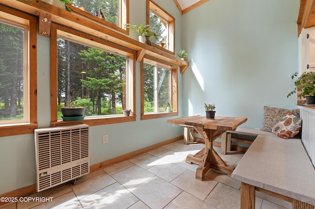 40996 Woodman Ln, Homer, AK 99603 - dining room featuring heating unit and light tile patterned floors