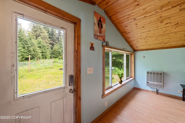 40996 Woodman Ln, Homer, AK 99603 - doorway to outside featuring heating unit, vaulted ceiling, wooden ceiling, and light wood finished floors