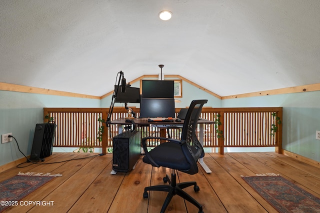 40996 Woodman Ln, Homer, AK 99603 - office area with lofted ceiling, a textured ceiling, and hardwood / wood-style flooring