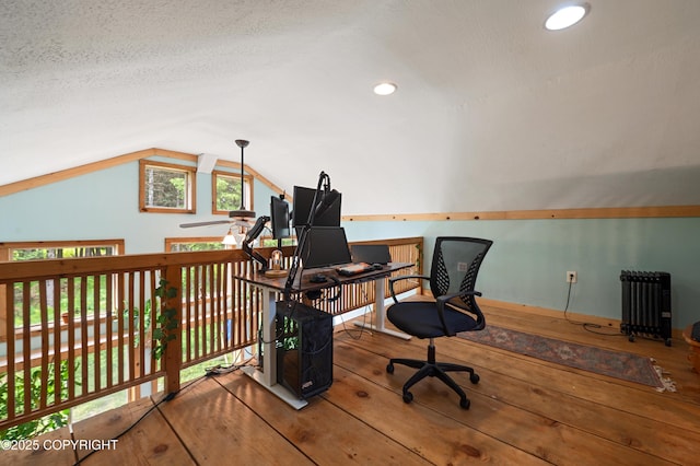 40996 Woodman Ln, Homer, AK 99603 - office area with radiator, hardwood / wood-style flooring, lofted ceiling, recessed lighting, and a textured ceiling