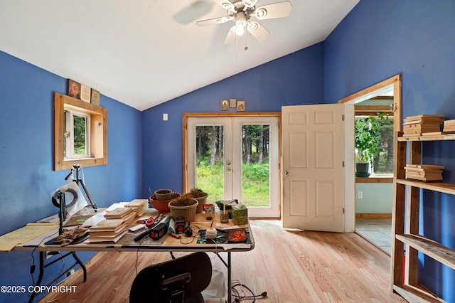 40996 Woodman Ln, Homer, AK 99603 - office area featuring vaulted ceiling, healthy amount of natural light, a ceiling fan, wood finished floors, and french doors