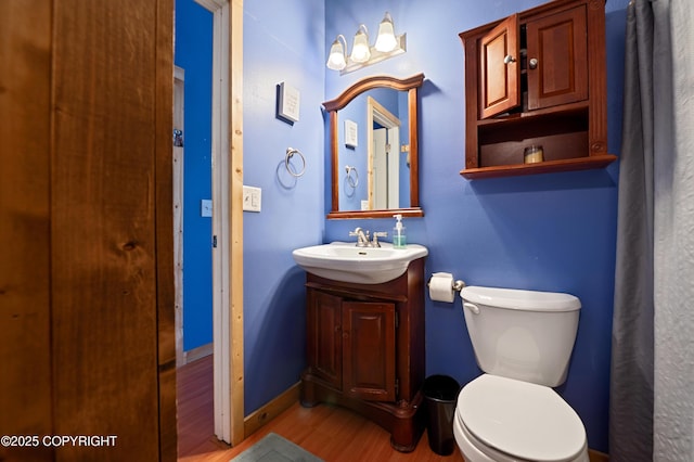 40996 Woodman Ln, Homer, AK 99603 - bathroom with wood finished floors and vanity