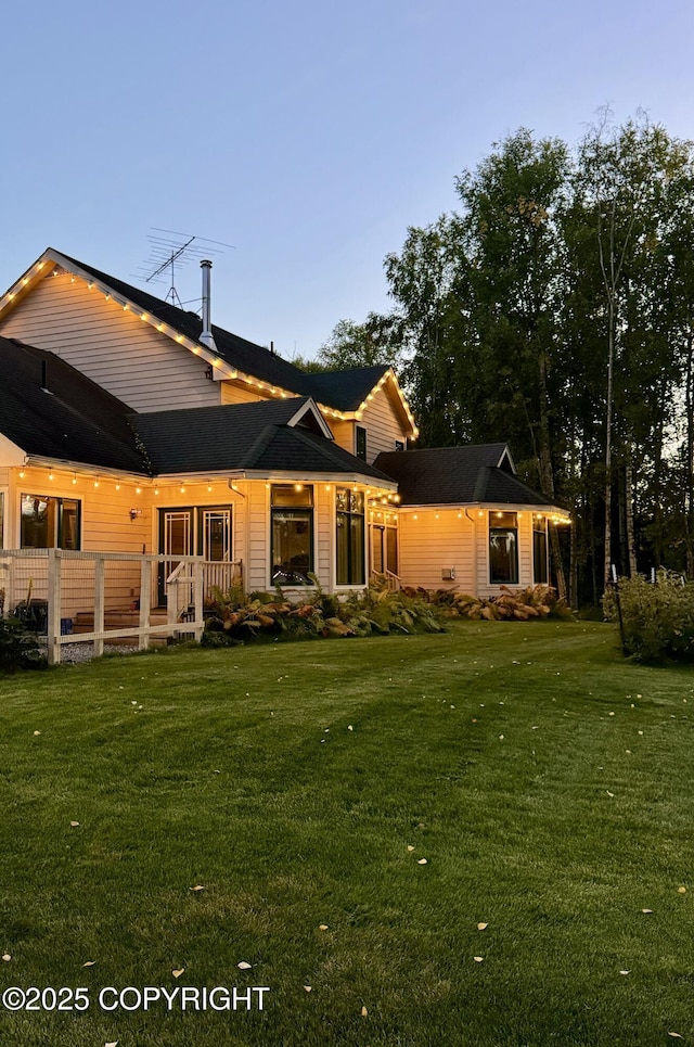 9803 W King Arthur Dr, Wasilla, AK 99623 - back of property featuring a lawn