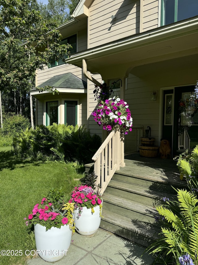 9803 W King Arthur Dr, Wasilla, AK 99623 - view of exterior entry with a porch