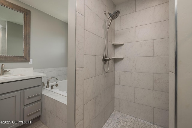 5062 E Calf Cir, Wasilla, AK 99654 - full bathroom featuring a garden tub, vanity, and a tile shower