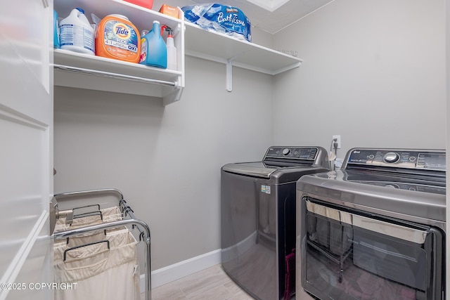 5062 E Calf Cir, Wasilla, AK 99654 - washroom featuring separate washer and dryer and baseboards