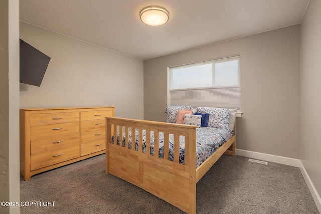 5062 E Calf Cir, Wasilla, AK 99654 - carpeted bedroom featuring baseboards