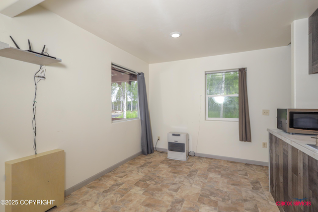 20057 E Caswell Lakes Rd, Willow, AK 99688 - unfurnished dining area with stone finish flooring and recessed lighting