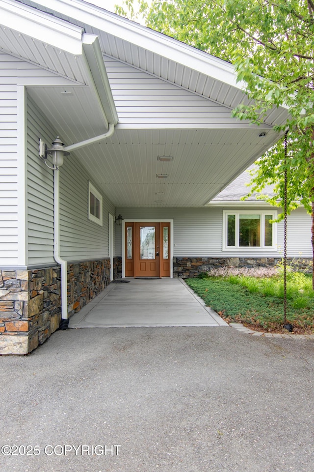 1103 Inlet Woods Dr, Kenai, AK 99611 - property entrance with stone siding