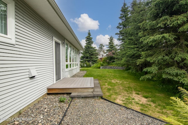 1103 Inlet Woods Dr, Kenai, AK 99611 - view of green lawn with a deck