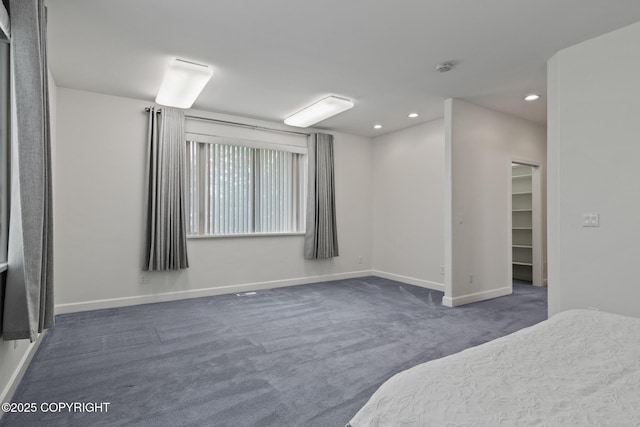 1103 Inlet Woods Dr, Kenai, AK 99611 - unfurnished bedroom featuring carpet floors, a spacious closet, and recessed lighting