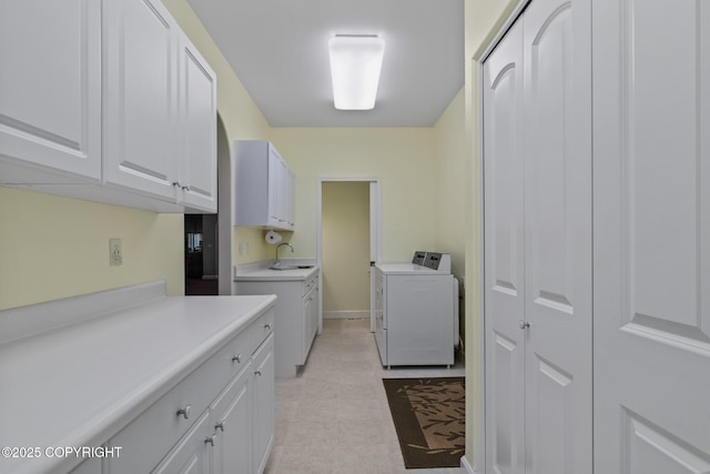 1103 Inlet Woods Dr, Kenai, AK 99611 - laundry room with washing machine and dryer and cabinet space