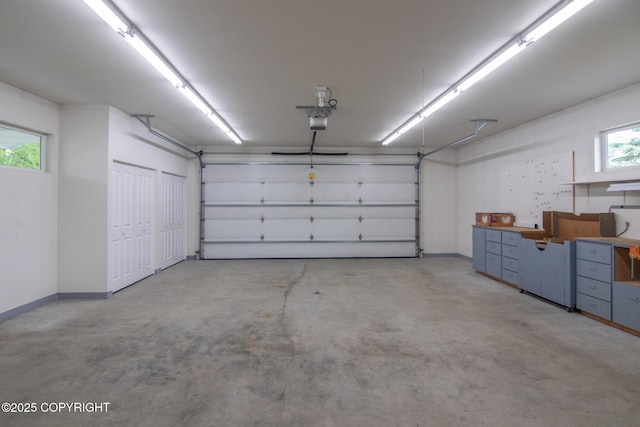 1103 Inlet Woods Dr, Kenai, AK 99611 - garage featuring a garage door opener