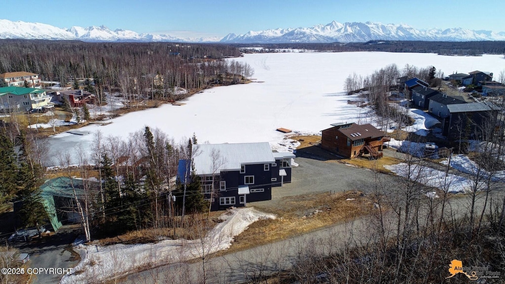 445 Westcove Dr, Wasilla, AK 99654 - snowy aerial view featuring a mountain view and a forest view