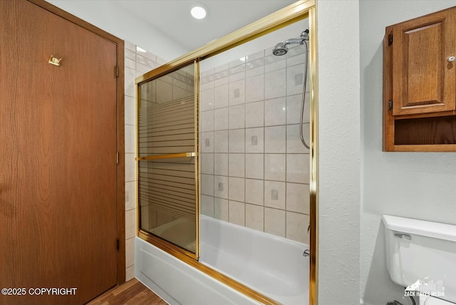 1521 Cache Dr, Anchorage, AK 99507 - bathroom with enclosed tub / shower combo and toilet