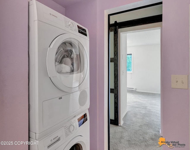 3265 Montclair Ct # 17E, Anchorage, AK 99503 - washroom with stacked washer / dryer, carpet, and a baseboard heating unit