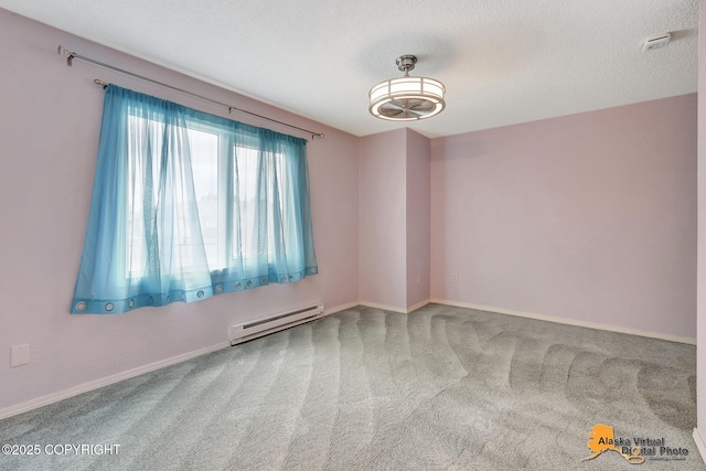 3265 Montclair Ct # 17E, Anchorage, AK 99503 - carpeted spare room featuring baseboard heating and a textured ceiling