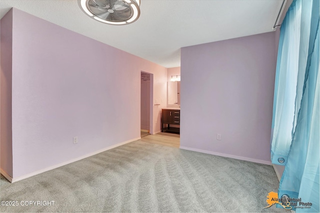 3265 Montclair Ct # 17E, Anchorage, AK 99503 - carpeted empty room with baseboards