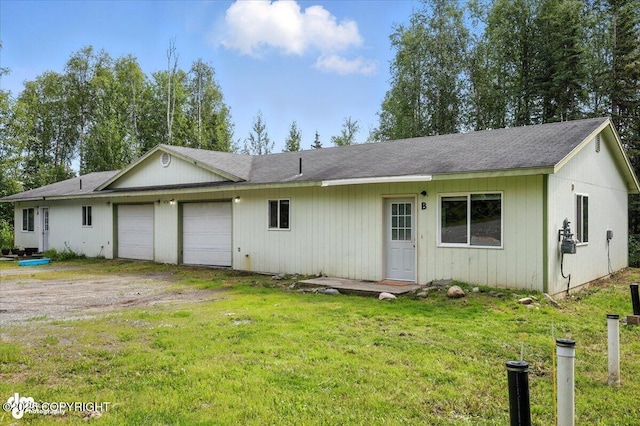 6710 W Joes Dr, Wasilla, AK 99623 - single story home with a garage, a front lawn, and dirt driveway