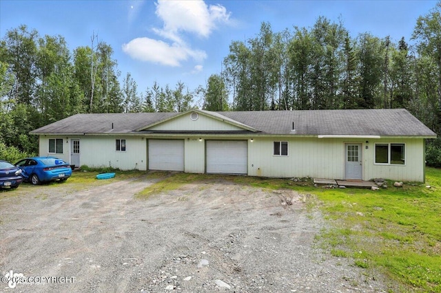 6710 W Joes Dr, Wasilla, AK 99623 - ranch-style house featuring an attached garage and dirt driveway