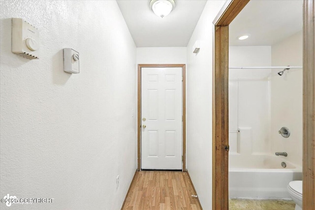 6710 W Joes Dr, Wasilla, AK 99623 - hallway featuring light wood finished floors