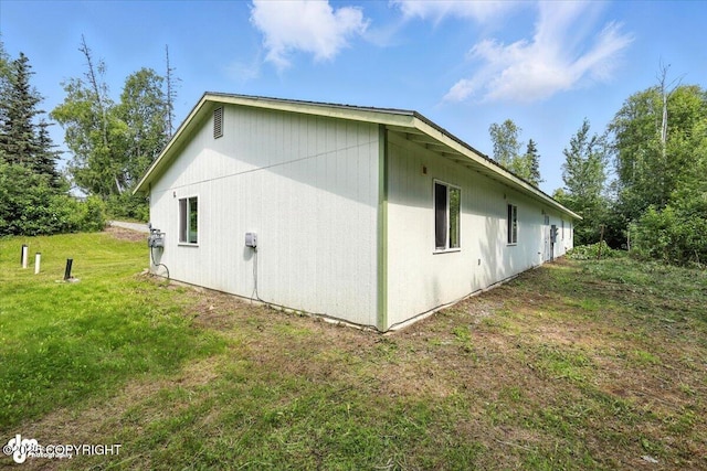 6710 W Joes Dr, Wasilla, AK 99623 - view of property exterior featuring a yard