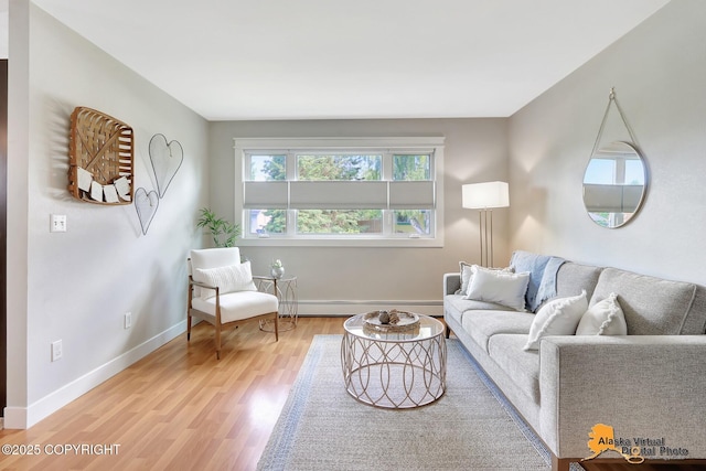 3306 E 19th Ct, Anchorage, AK 99508 - living area featuring baseboard heating and light wood finished floors