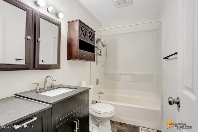 791 N Yakima St, Wasilla, AK 99654 - full bathroom with vanity, shower / tub combination, and stone finish flooring