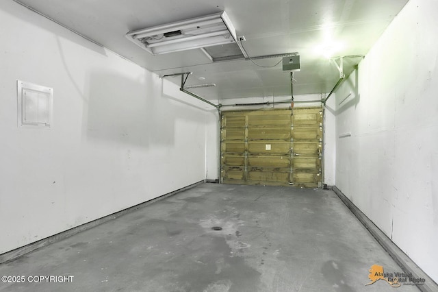791 N Yakima St, Wasilla, AK 99654 - garage featuring a garage door opener and electric panel