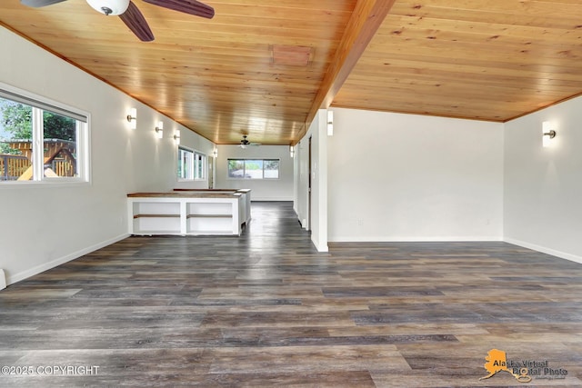 1915 Stanford Dr, Anchorage, AK 99508 - empty room featuring wood ceiling, a ceiling fan, wood finished floors, vaulted ceiling, and crown molding