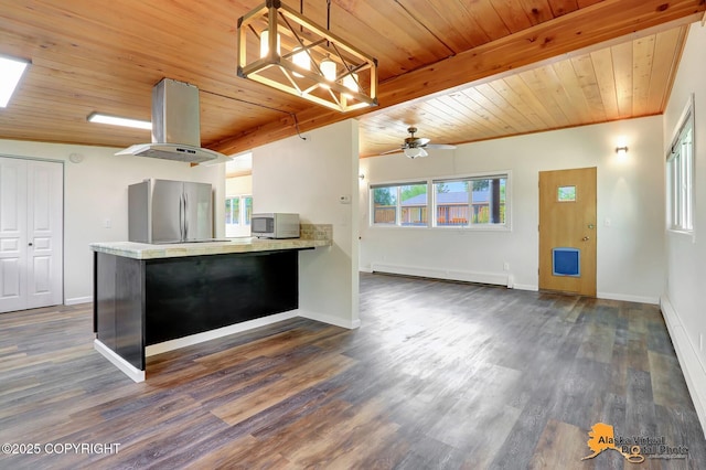 1915 Stanford Dr, Anchorage, AK 99508 - kitchen featuring appliances with stainless steel finishes, a wood ceiling with exposed beams, a baseboard heating unit, island exhaust hood, and dark wood-style floors