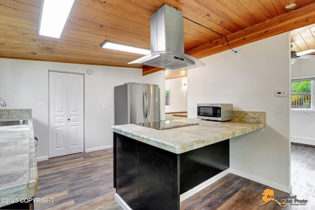 1915 Stanford Dr, Anchorage, AK 99508 - kitchen with stainless steel appliances, island range hood, wood ceiling, a peninsula, and dark wood-style flooring