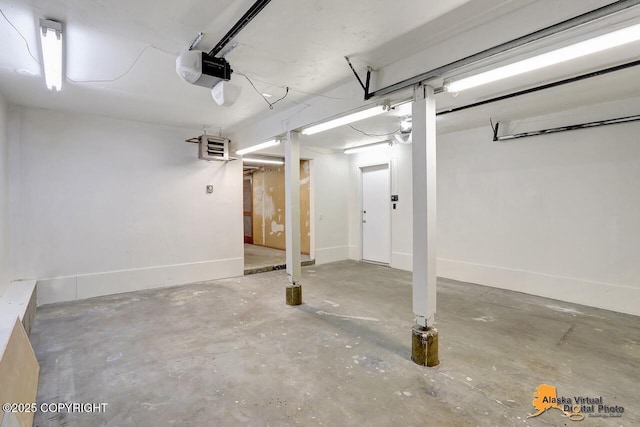1915 Stanford Dr, Anchorage, AK 99508 - garage featuring a garage door opener and a heating unit