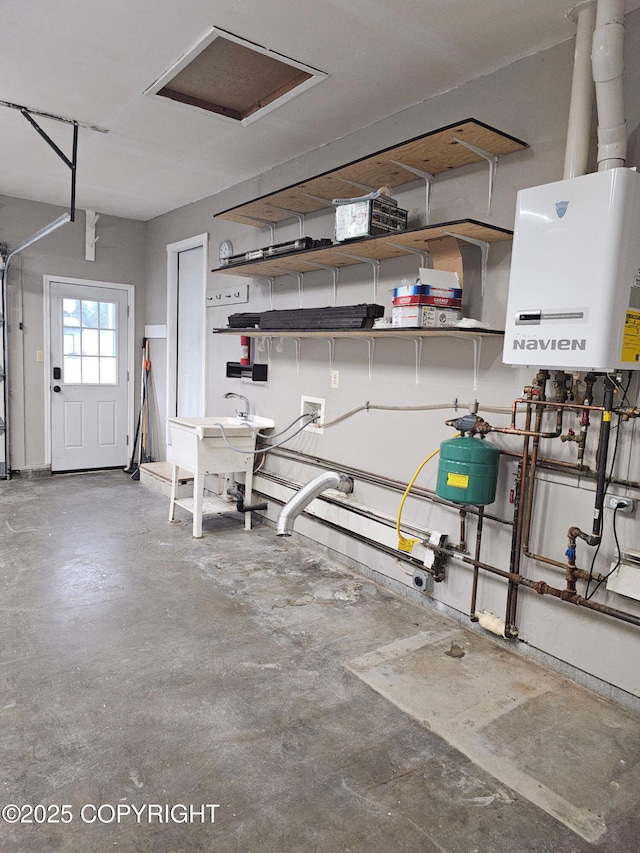 150 S Leibrock St, Soldotna, AK 99669 - garage with water heater and a sink