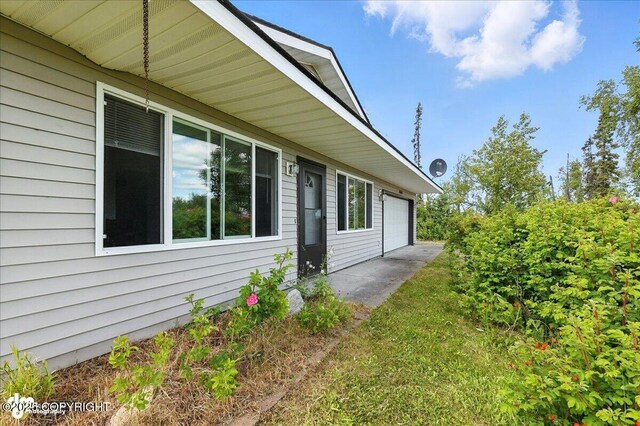 46640 Jo Ave, Kenai, AK 99611 - view of property exterior with a garage