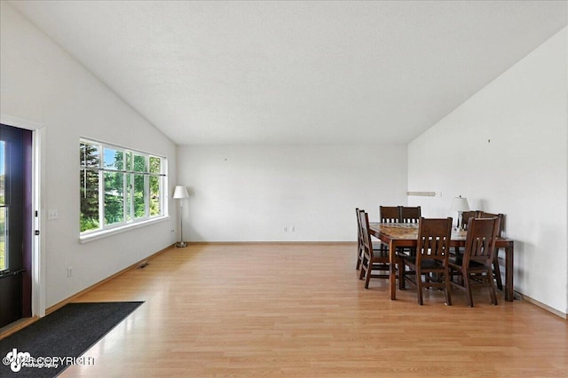 46640 Jo Ave, Kenai, AK 99611 - dining area with wood finished floors and lofted ceiling