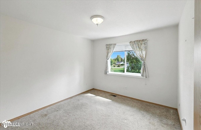 46640 Jo Ave, Kenai, AK 99611 - empty room with carpet floors